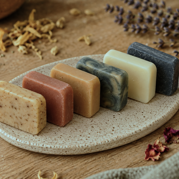 6 HUGOLA travel size soaps on ceramic soap holder