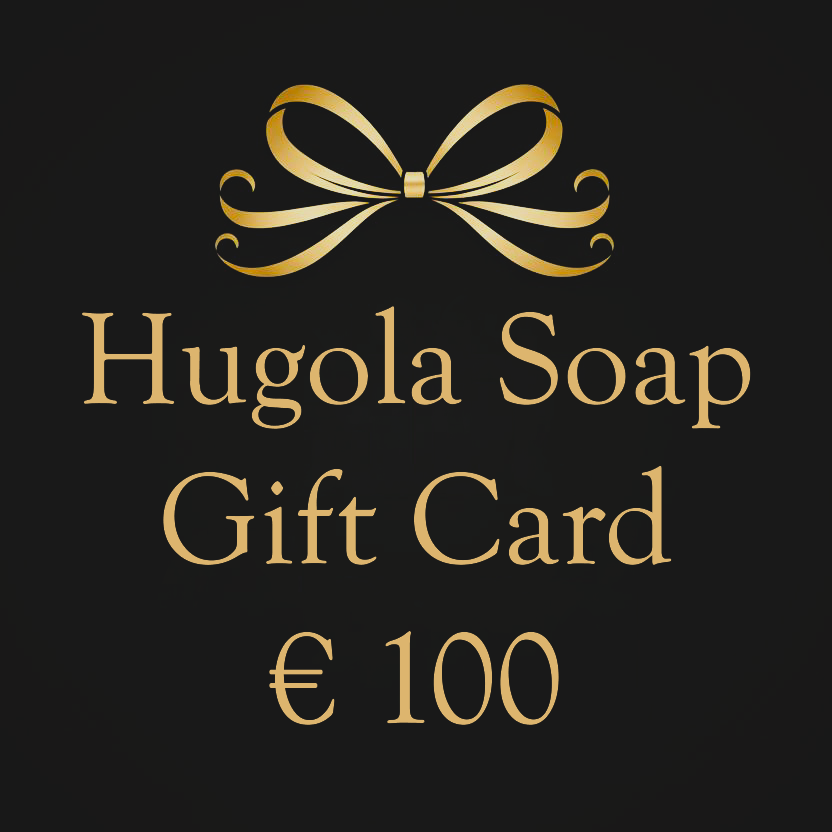 Hugola Soap € 100 gift card with a gold bow on a black background