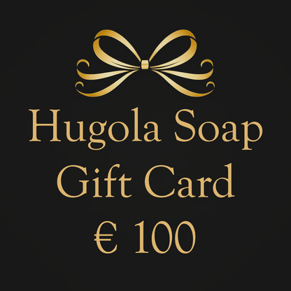 Hugola Soap € 100 gift card with a gold bow on a black background