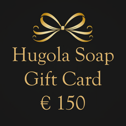 Hugola Soap  €150 gift card with a gold bow on a black background