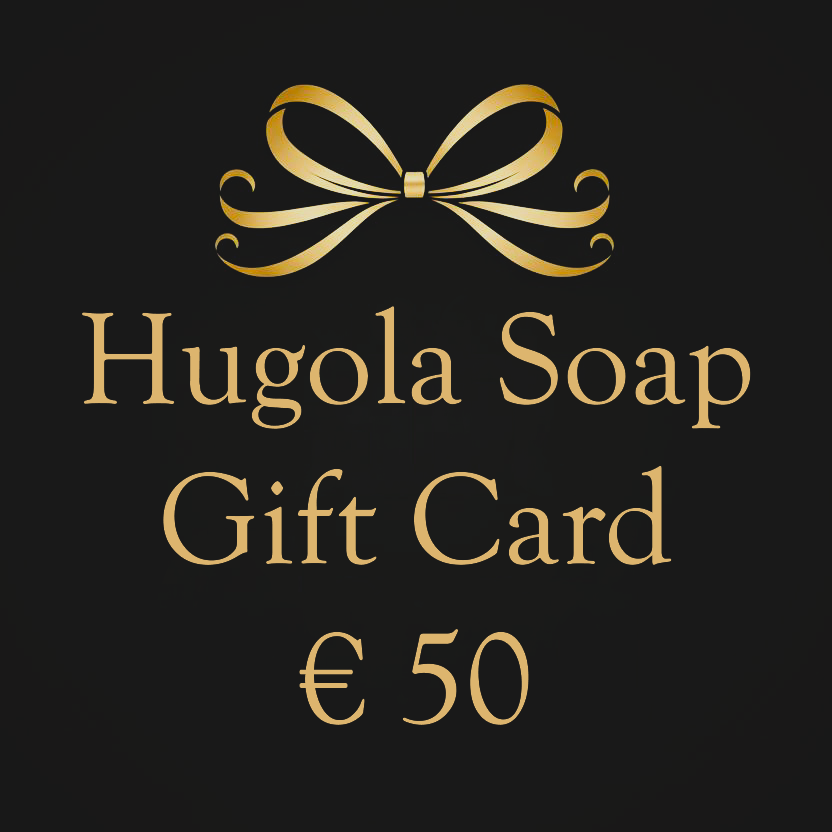 Hugola Soap € 50 gift card with a gold bow on a black background