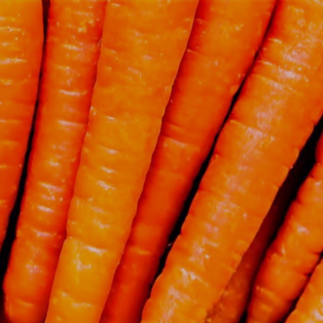 Close-up of fresh carrots used in natural skincare oil production