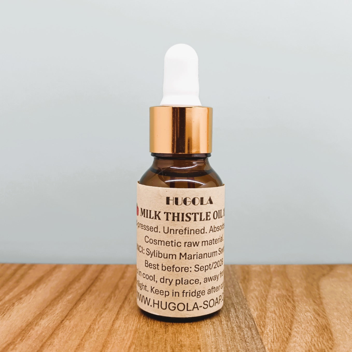 Milk thistle seed oil in a glass bottle