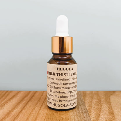 Milk thistle seed oil in a glass bottle