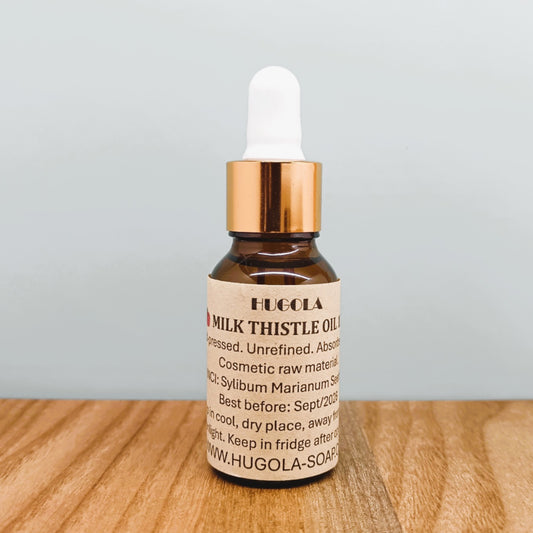 Milk thistle seed oil in a glass bottle