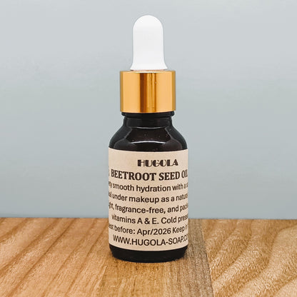 Beet Seed Oil, natural cold-pressed plant oil in glass bottle