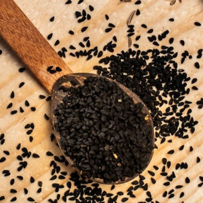 Close-up of black seeds used in natural nigella seed oil