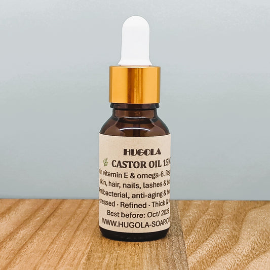 Castor Oil, natural cold-pressed plant oil in glass bottle