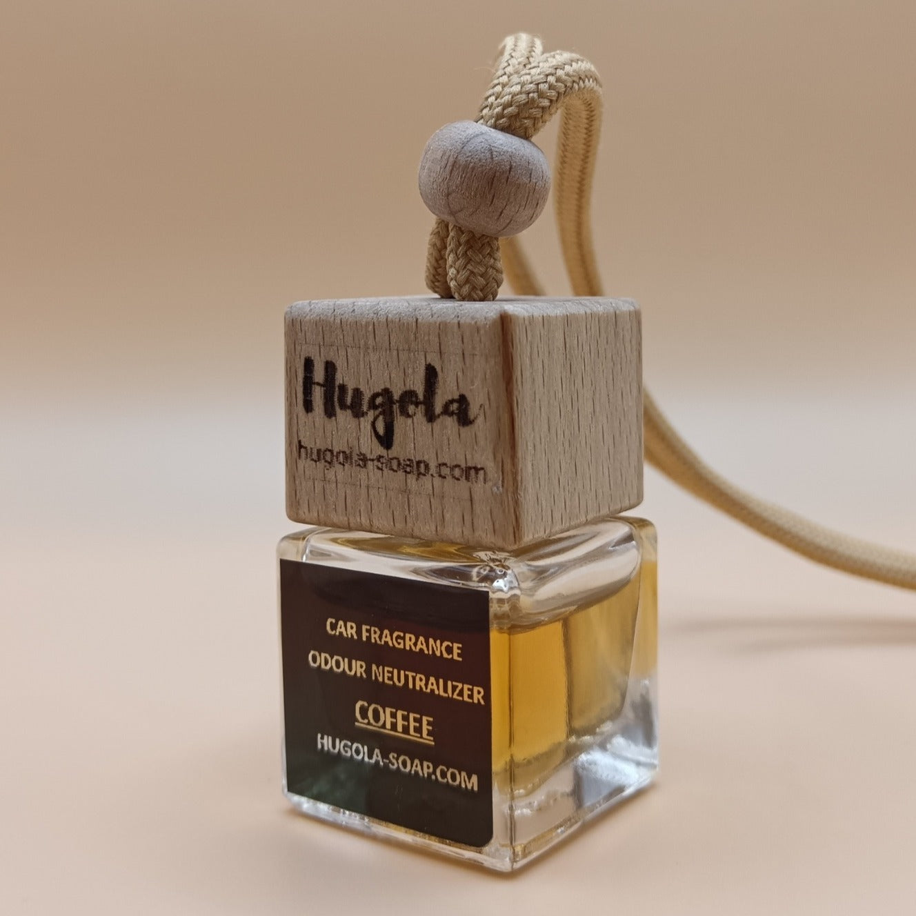 Hugola car fragrance diffuser, Coffee scent, angled view of glass bottle with wooden lid