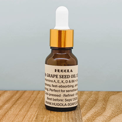 Grapeseed Oil, natural cold-pressed skin oil in glass bottle