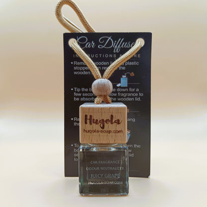 Hugola car fragrance diffuser, Juicy Grape scent, displayed with instruction card and wooden cap