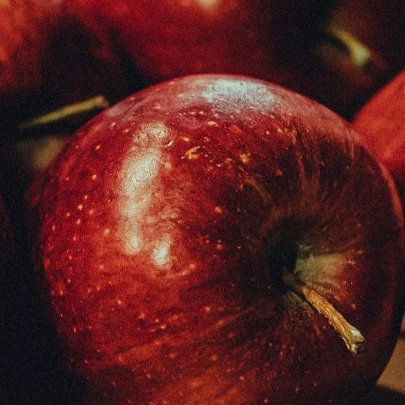 Close-up of fresh apple used in natural skincare oil production