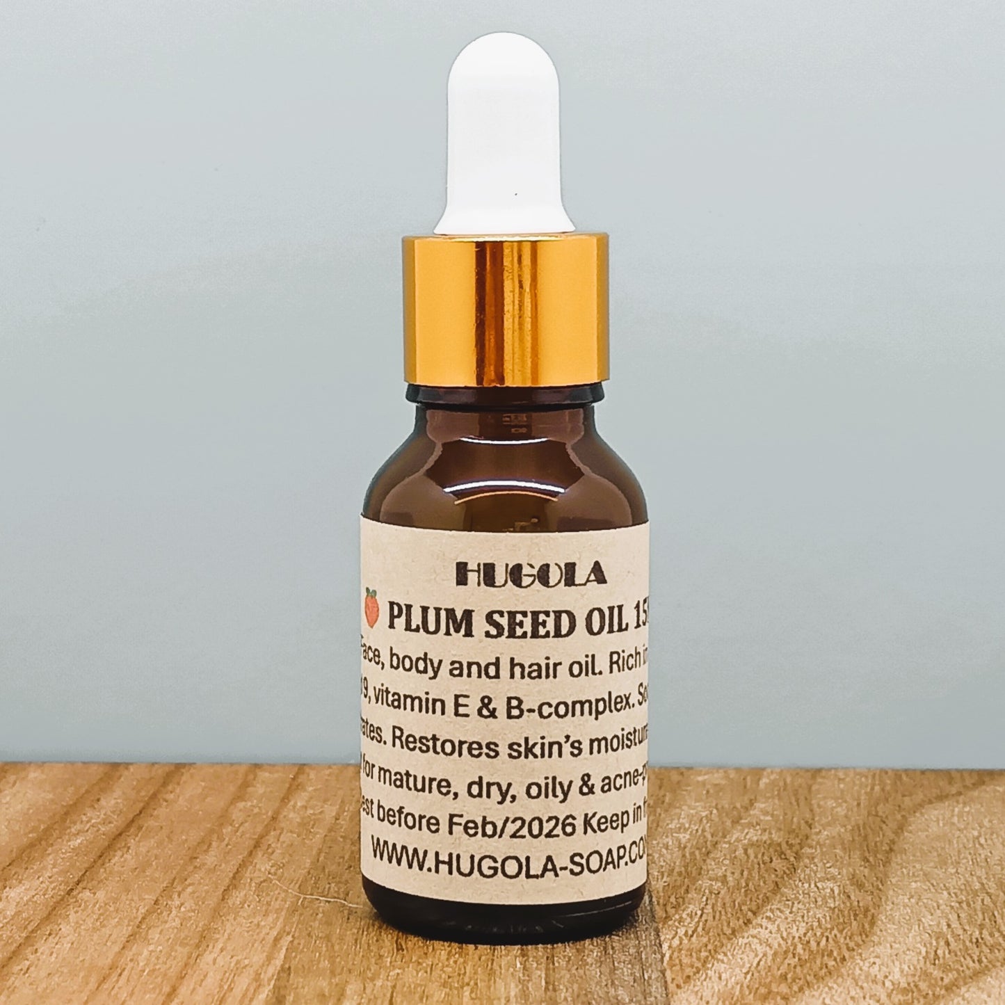 Plum Oil, natural cold-pressed skincare oil in glass bottle