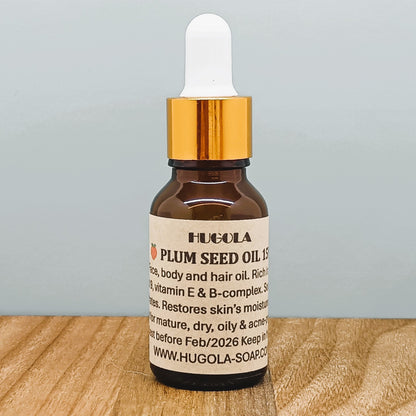 Plum Oil, natural cold-pressed skincare oil in glass bottle