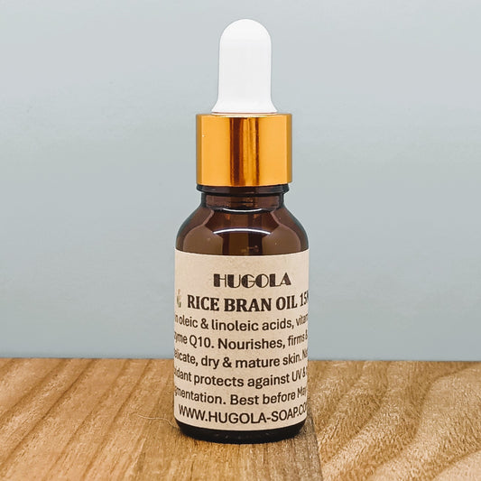 Rice Bran Oil, natural cold-pressed facial oil in glass bottle
