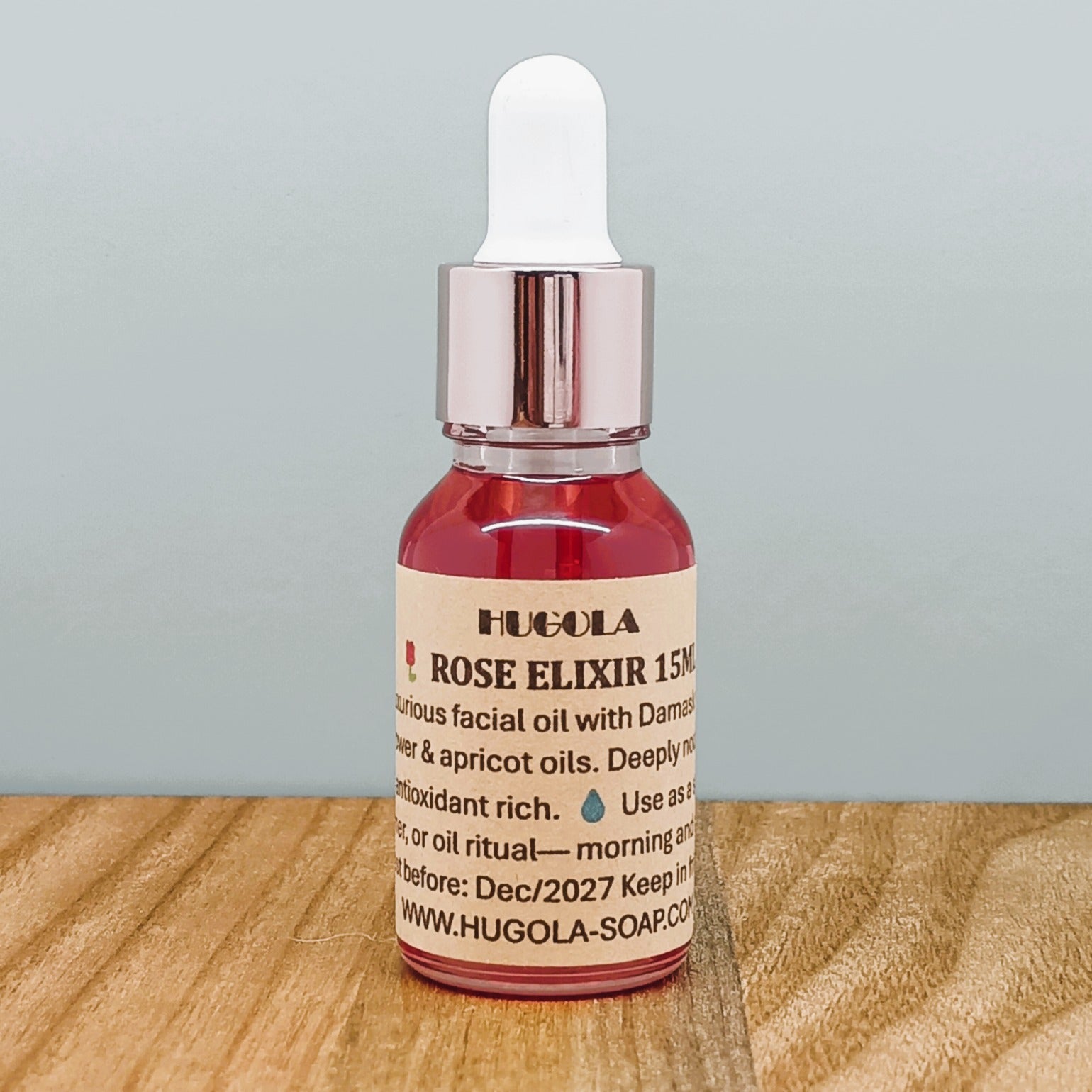 Rose Elixir natural facial oil in glass bottle for hydration and glow