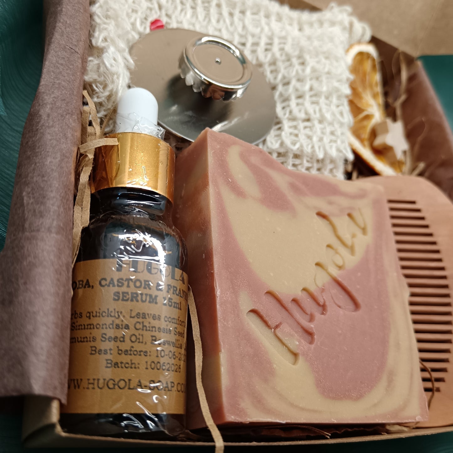 Serum bottle and soap with branding in a box