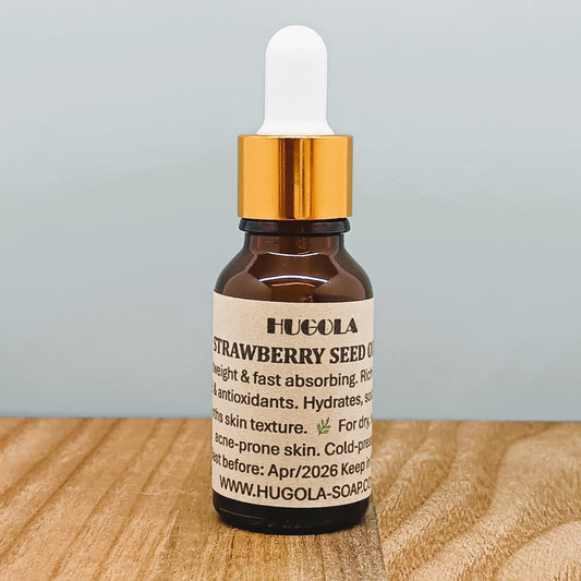 Strawberry Seed Oil, natural cold-pressed skincare oil in glass bottle