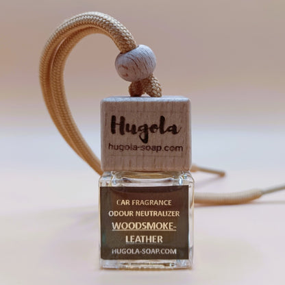 Hugola car fragrance diffuser, Woodsmoke & Leather scent, glass bottle with wooden cap and hanging cord